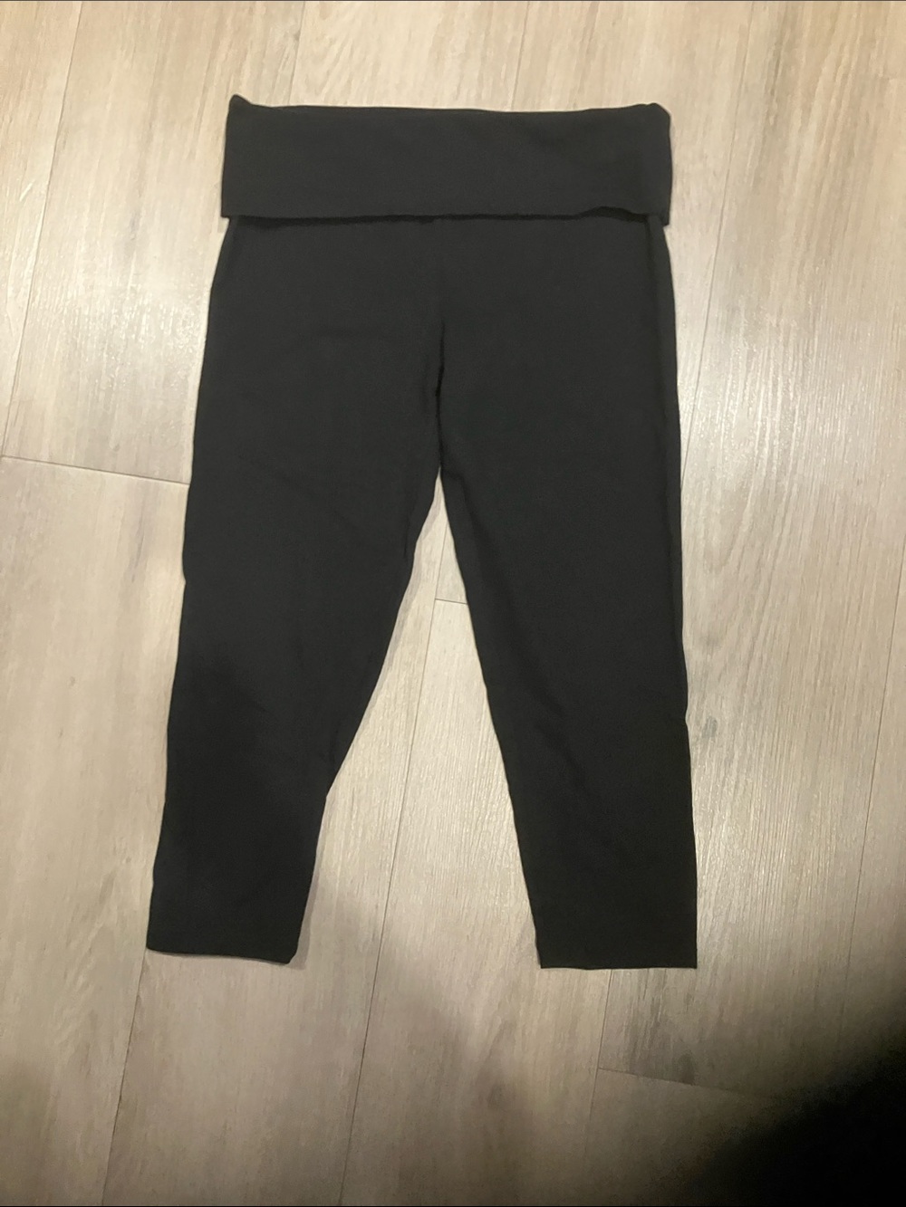 Victoria’s Secret crop leggings size S with “crystal wing” on fold over waist.